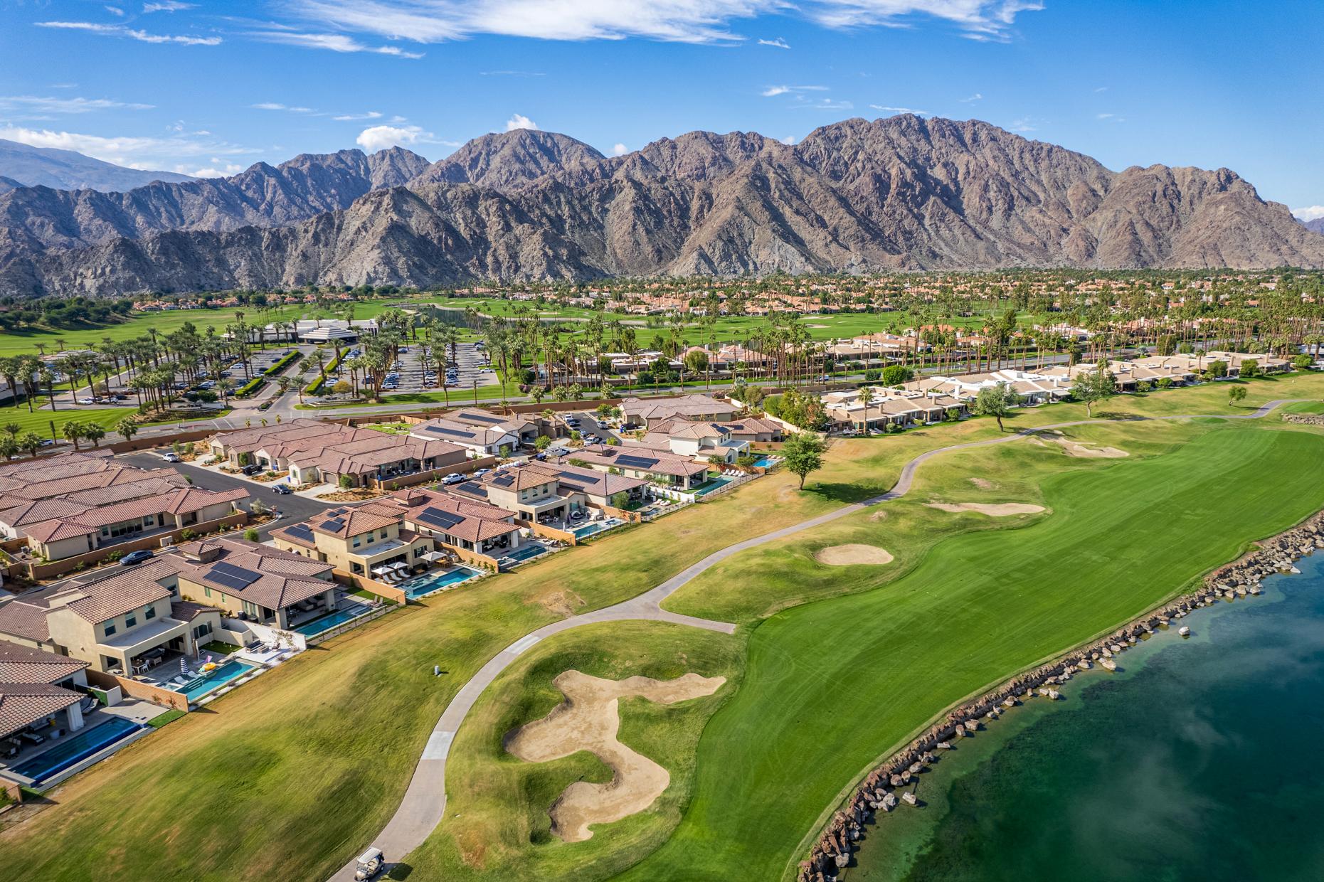 Aerial view over our Signature PGA West La Quinta rentals and the stunning golf course.